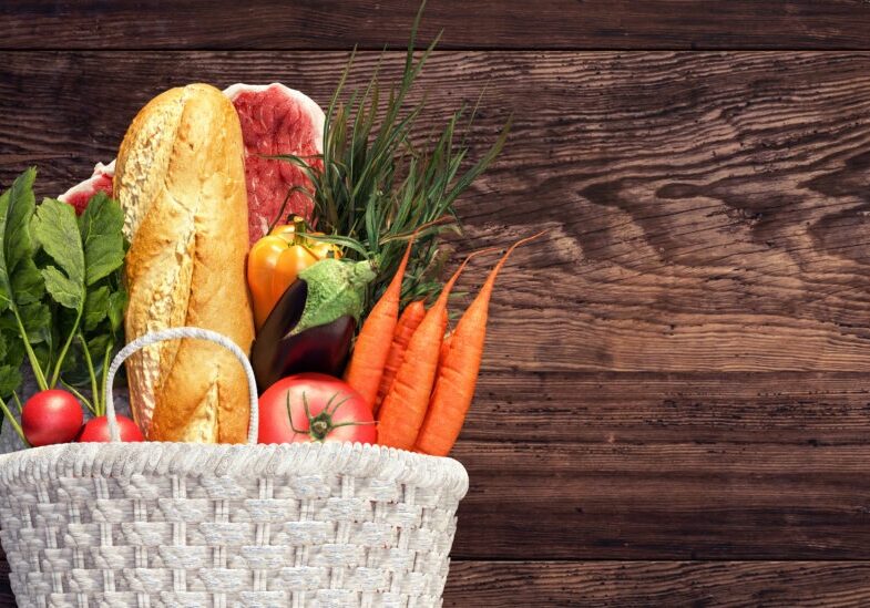 White basket full of groceries and vegetables on wood background 3D Rendering