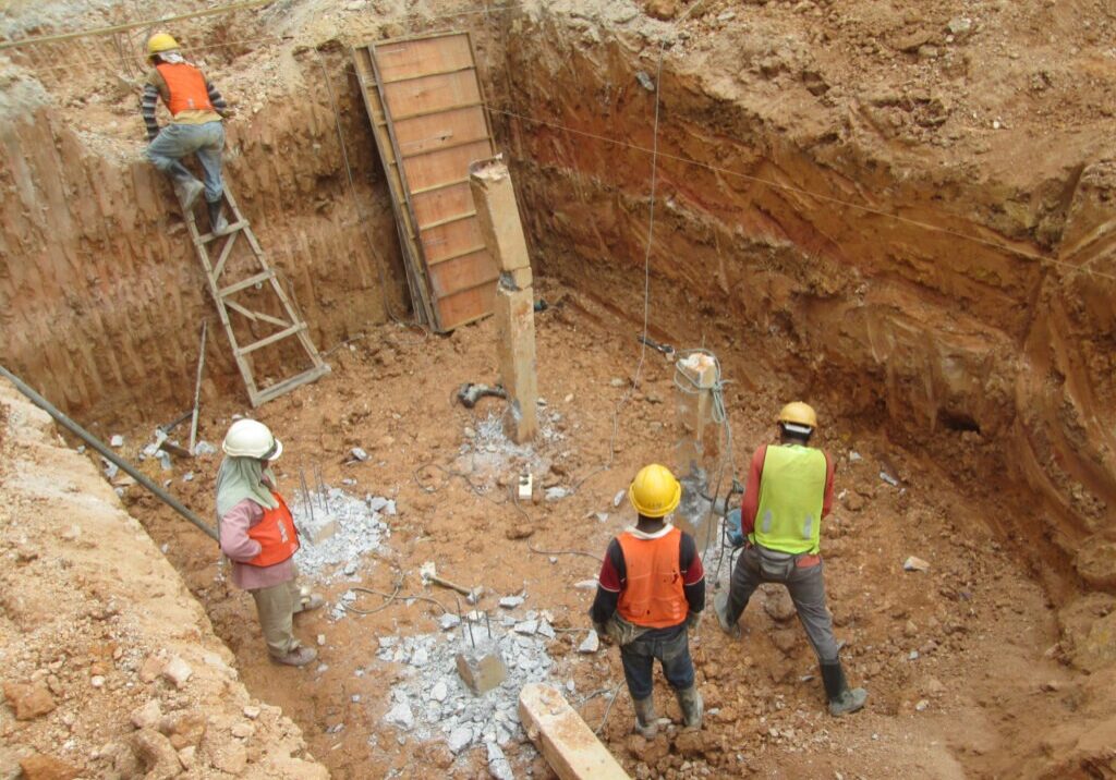 Excavated and cut to level bore pile at the construction site. Ready to construct pile cap reinforcement bar as next step of work.