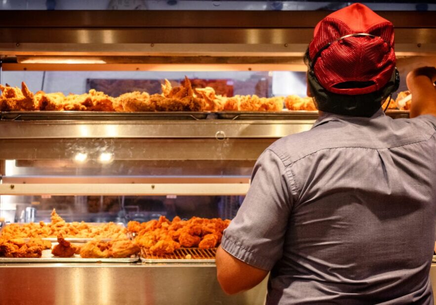 Minimum Wage Employee Works in a Fast Food Kitchen