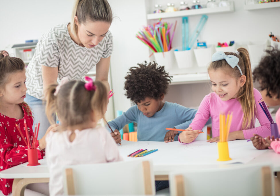 Teacher knows how to turn learning into a fun experience. Children in preschool.