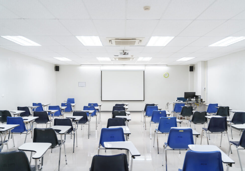 Thai lecture chairs and tables in public university classroom