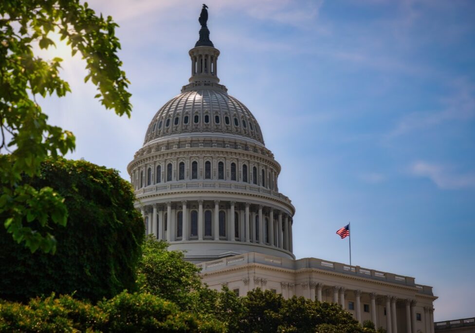 The United States Capitol Building in Washington DC on a summer day.