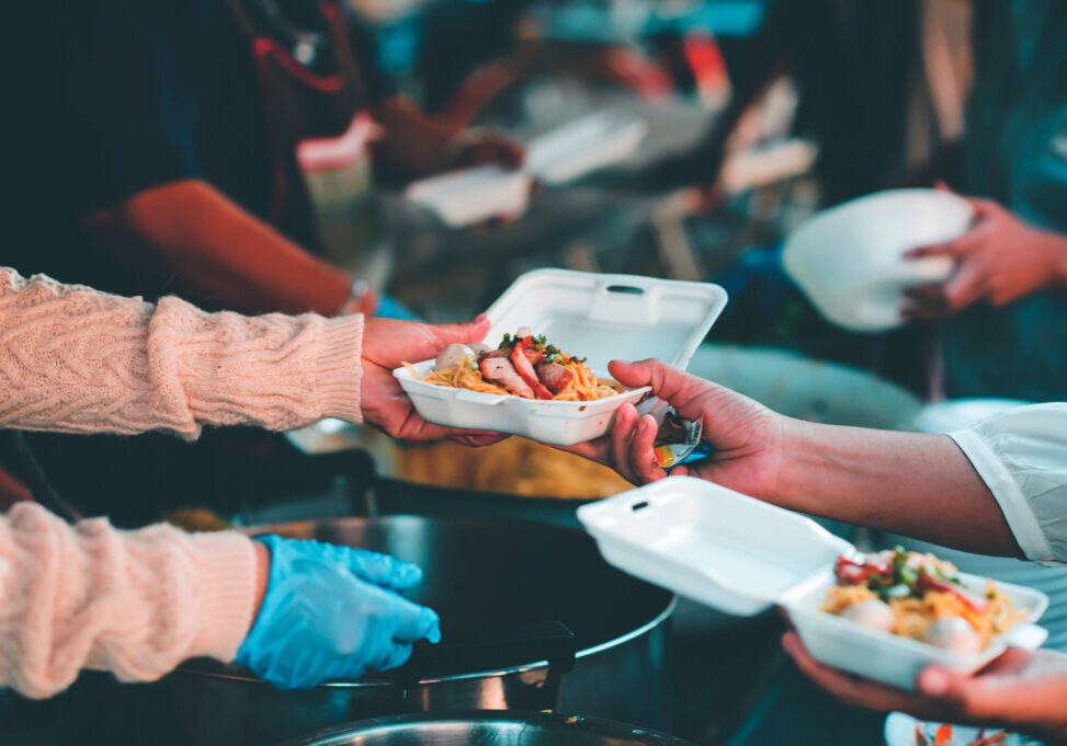 Feeding the poor to hands of a beggar : feeding food for beggar poverty concept