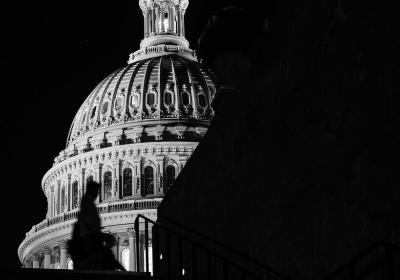 us capitol building at night shadow walker