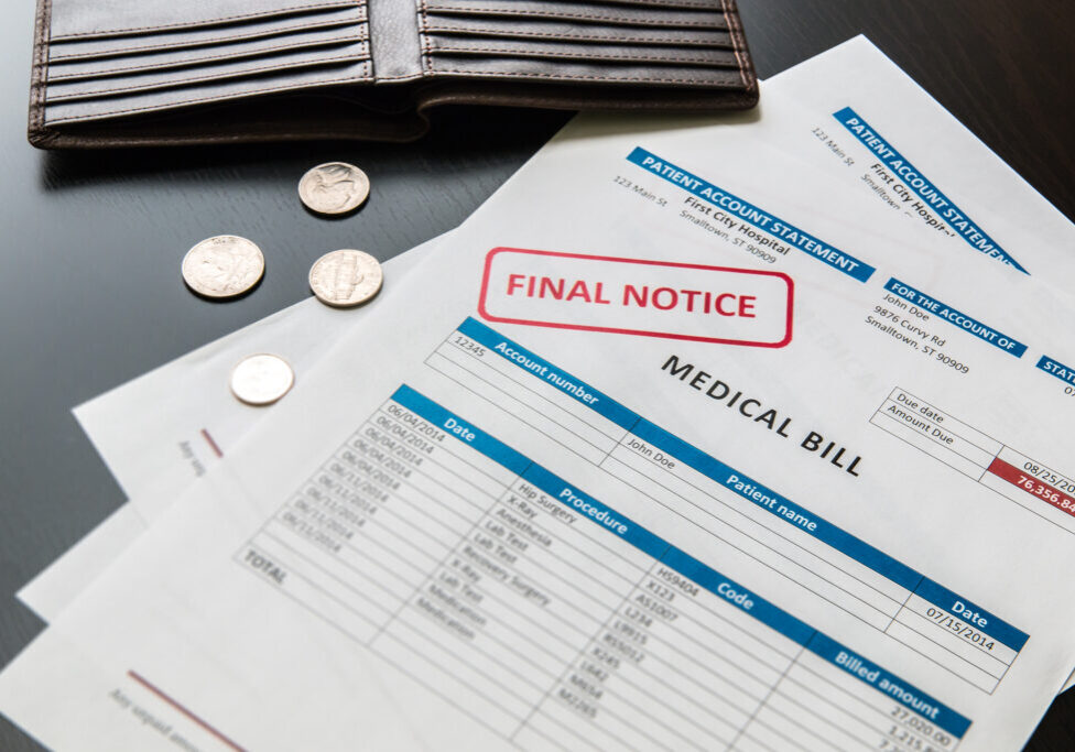 Medical bill from the hospital, concept of rising medical cost, selective focus.  All data on the bill and form design are fictional, created specially for this concept.